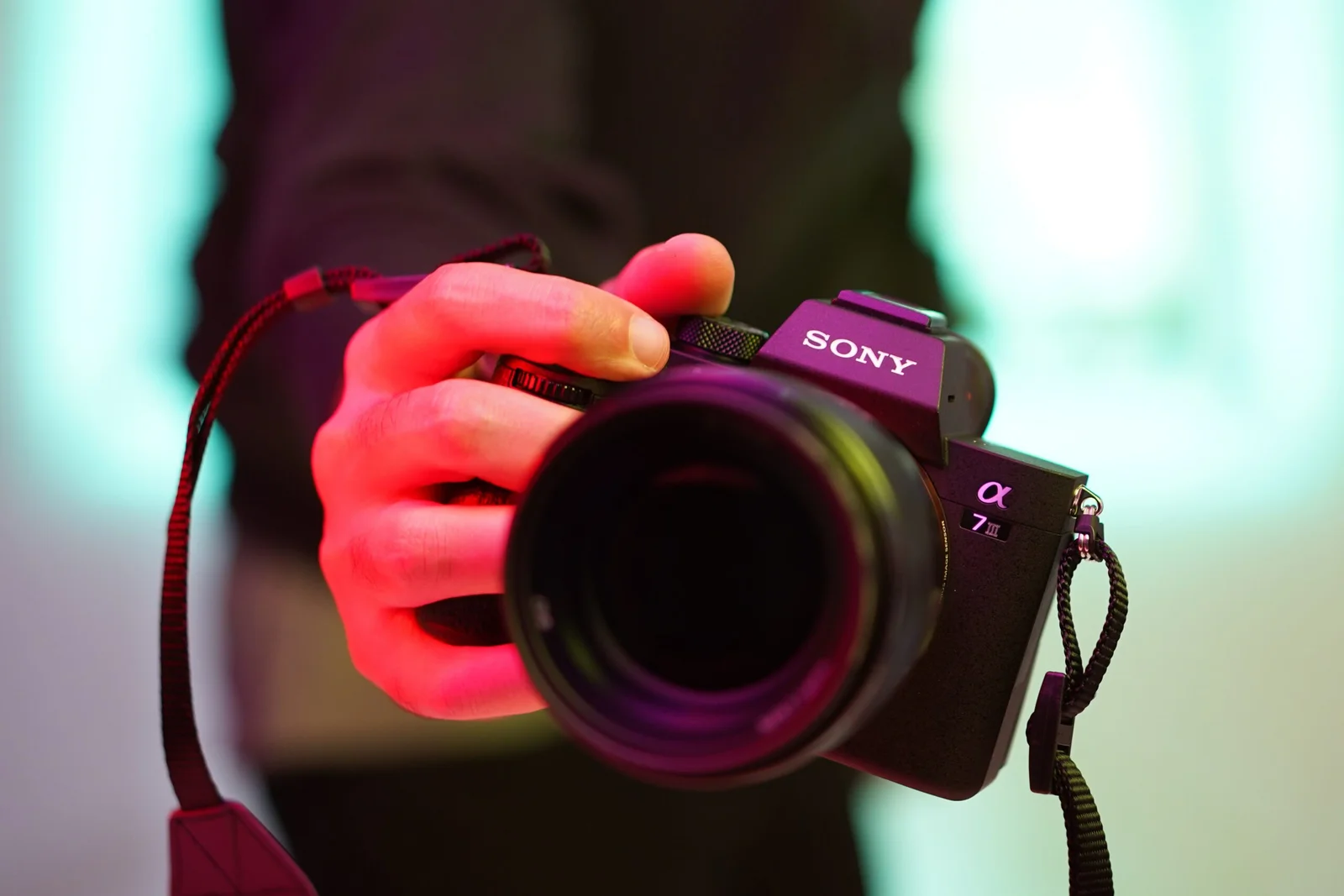person holding black nikon dslr camera person holding black nikon dslr camera